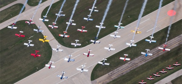 Large Formation over Oshkosh, photo by Chet Wehe, airwork credit Carl Brownd